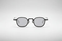 Blanco/negro con lentes grises